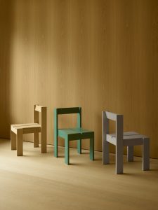 Group Image of three dining chairs in oak, green and grey. Foeppl Collection by Relvaokellermann for Holzrausch Editions.