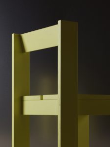 Detail of yellow dining chair of the Foeppl Collection by Relvaokellermann for Holzrausch Editions.